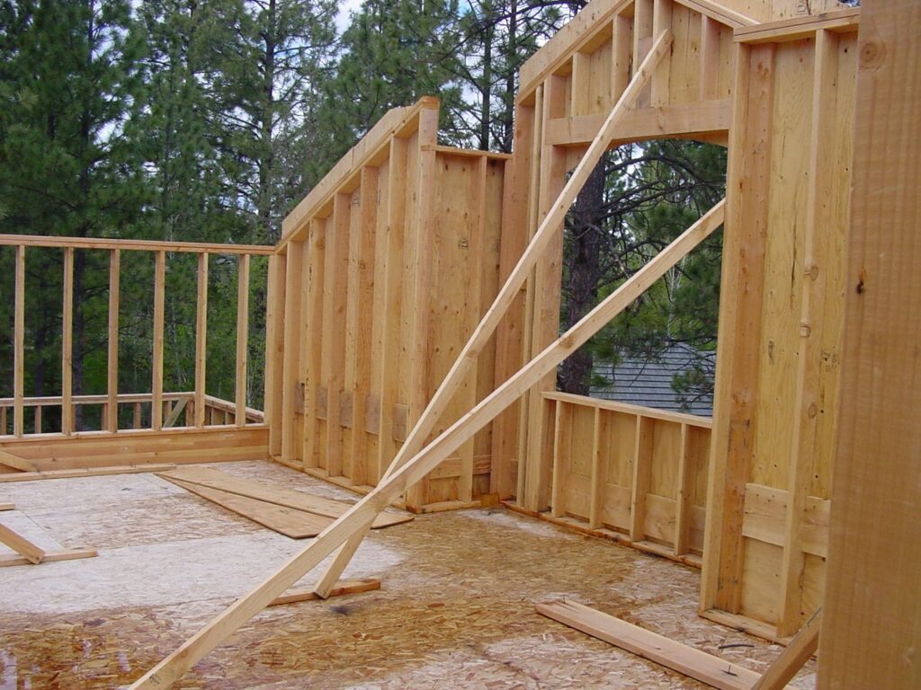 Braced wood-frame walls with diagonal supports and sheathing, part of managing seismic, shear, and lateral framing