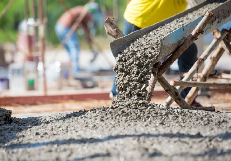 Custom home foundation being formed and poured on a Vancouver residential lot showing the concrete forming timeline