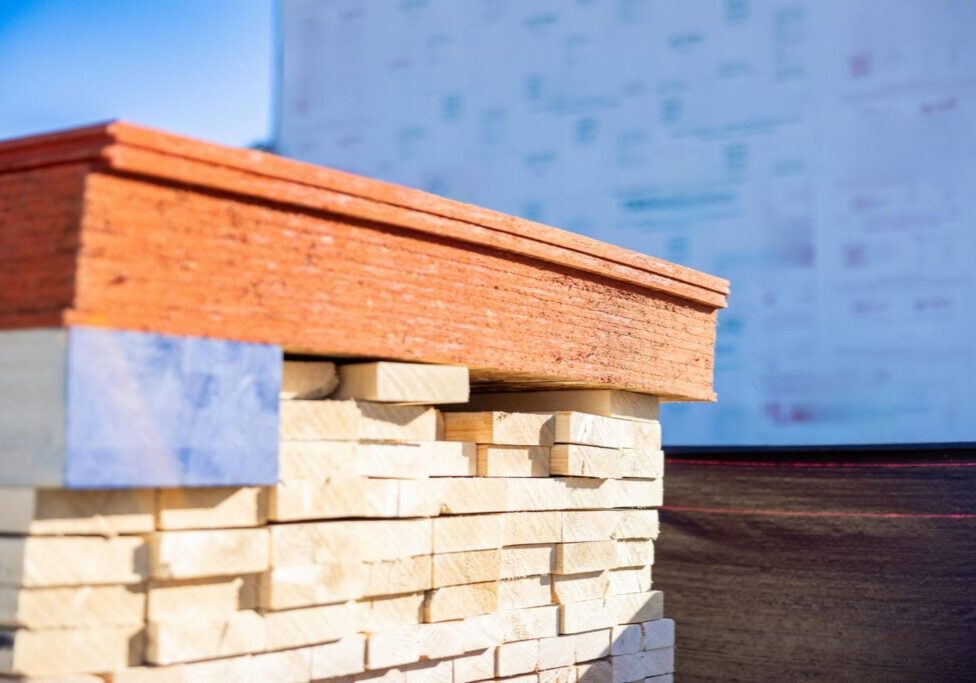 engineered-lumber-lvl-beam-dimensional-lumber-stack-jobsite